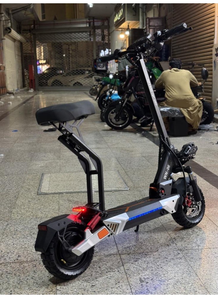 سكوتر روسي مونستر كهربائي 48 فولت 3000 واط – إطارات بدون أنابيب 11 بوصة | سرعة قصوى 65 كم/س | بطارية 48 فولت 15 أمبير | تعليق أمامي وخلفي | مصابيح LED مزدوجة | 3 سرعات | تصميم قابل للطي | شاشة رقمية | اتصال بلوتوث - Image 4